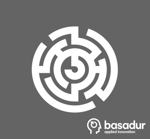 Basadur Applied Innovation logo in the bottom right corner, a grey background, with a maze in white representing problem solving in the middle.